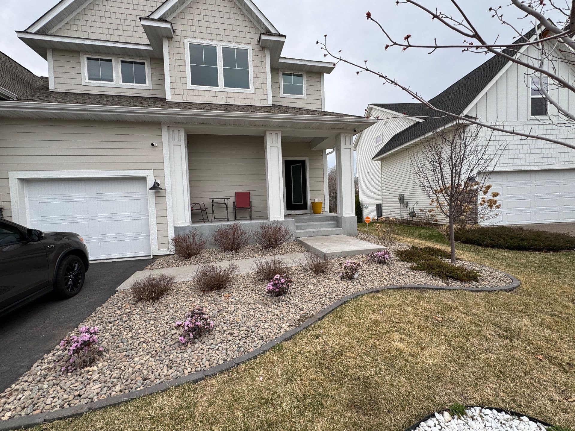 River Rock and Steel Edging Upgrade That Sharpens Curb Appeal image