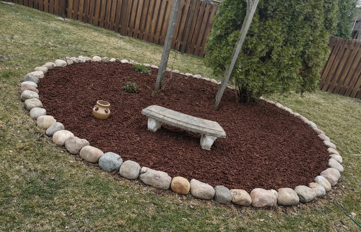 Gallery photos for From Overgrown Mess to Clean Backyard Garden Bed: Image #1